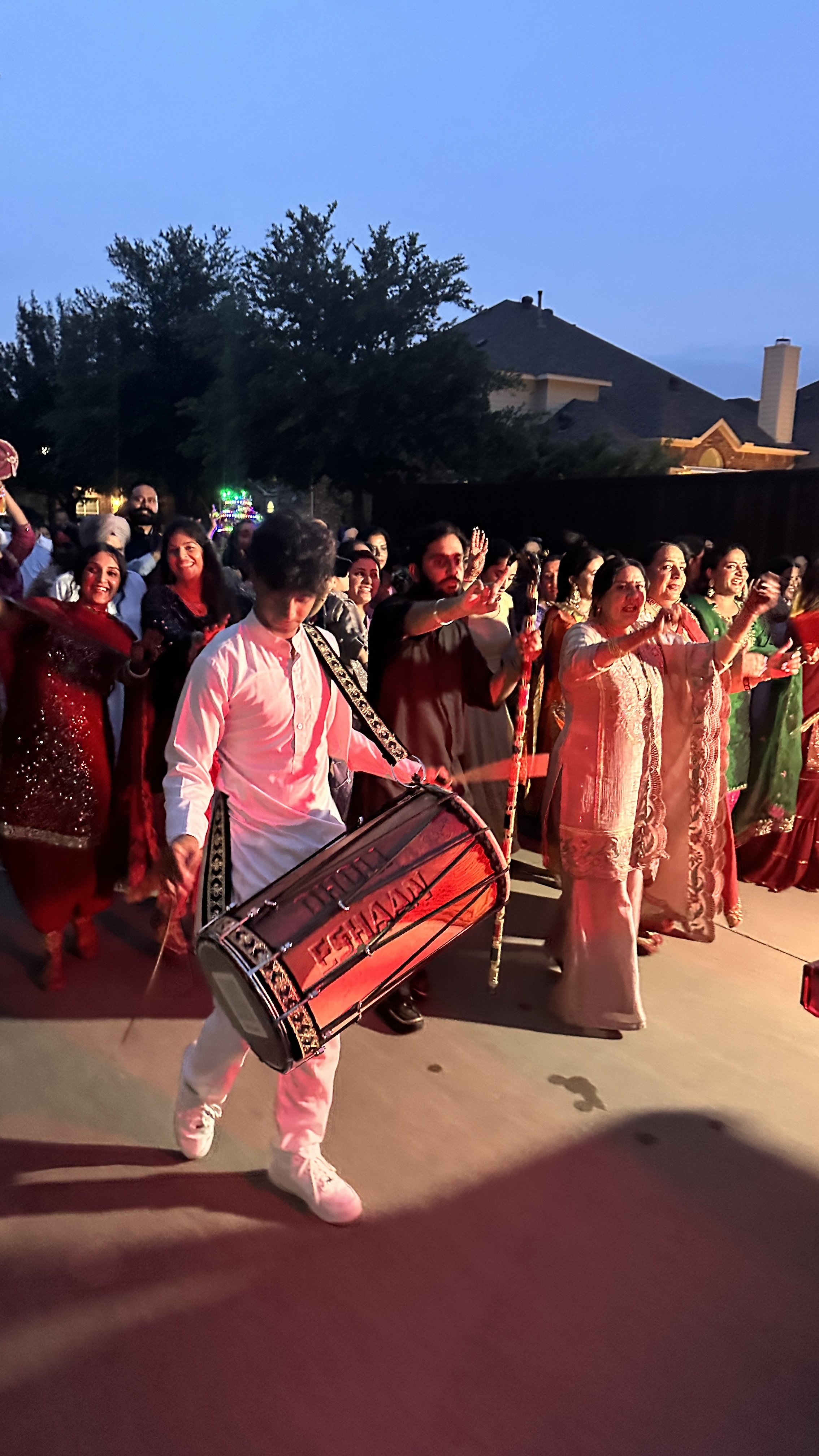 Dholi Eshaan playing dhol
